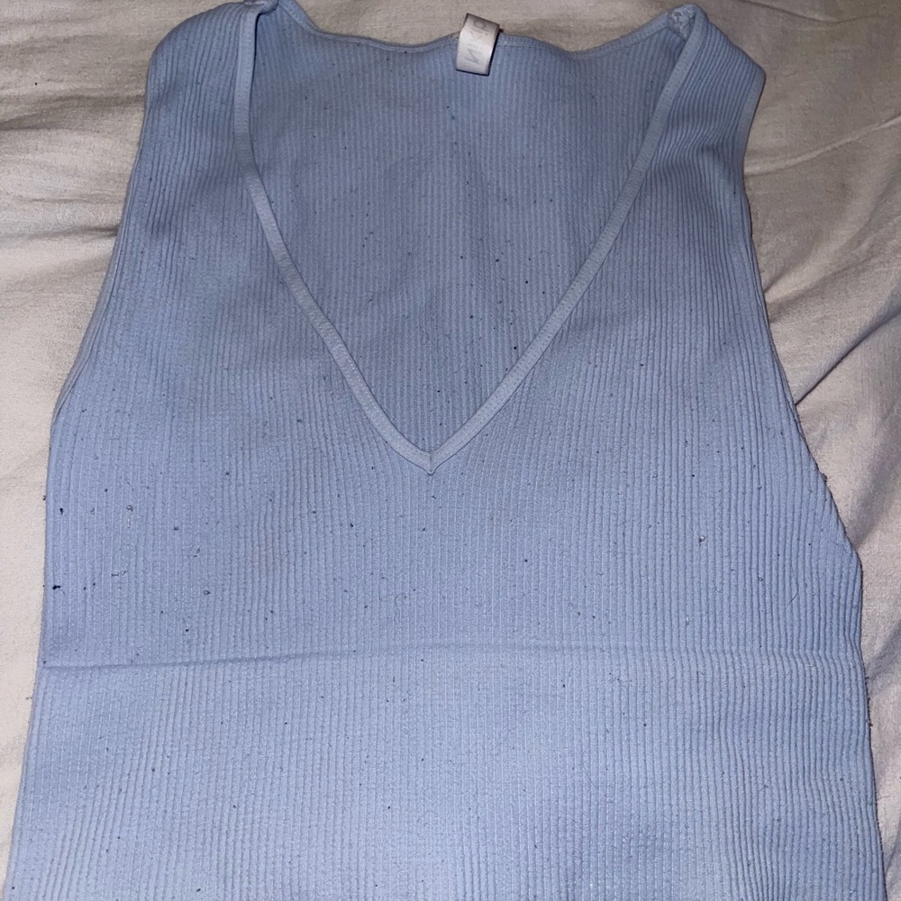 tight fit tank top from Nikibiki. ONE SIZE FITS ALL.